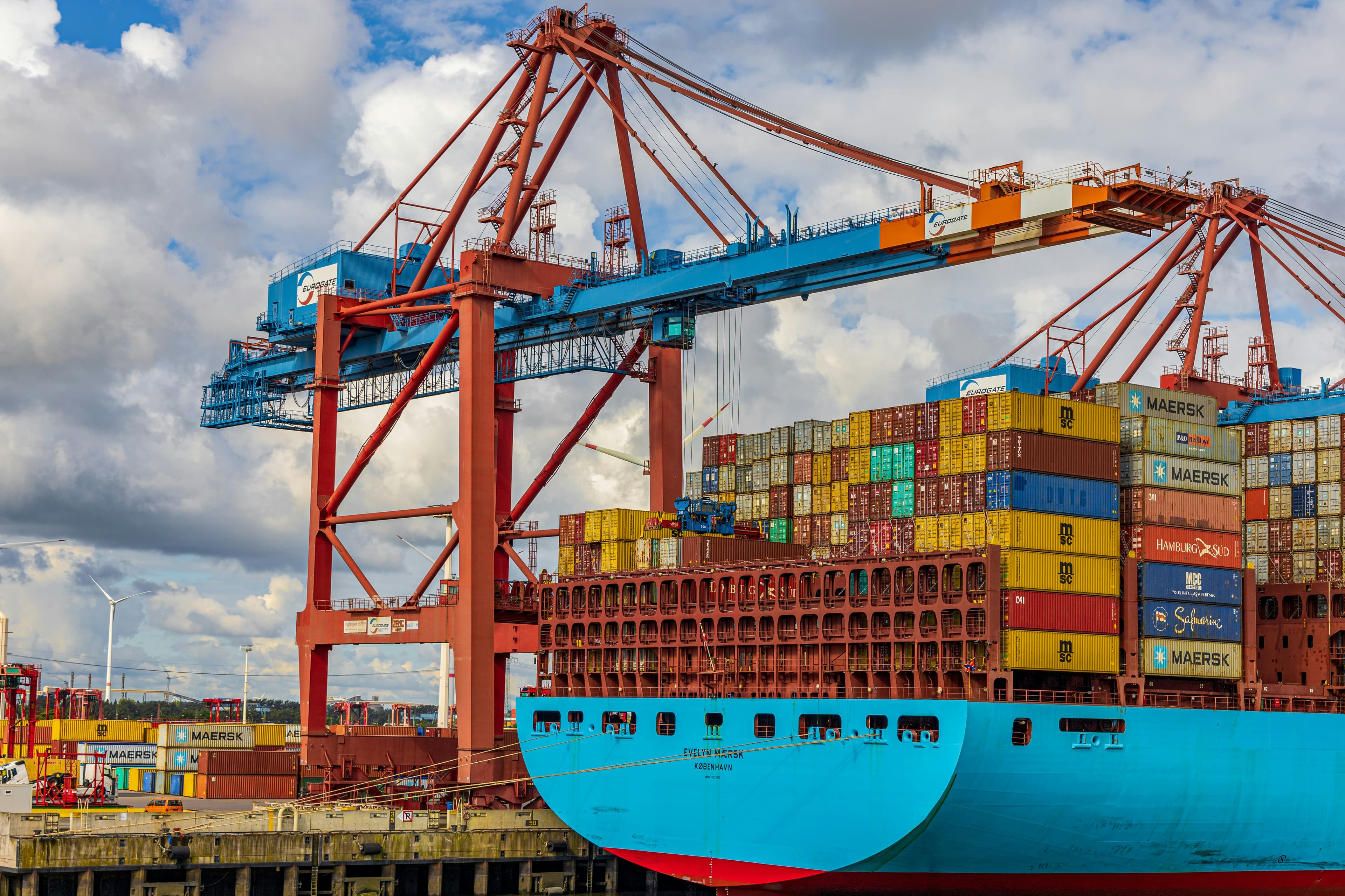 Ship-to-shore cranes loading a container ship